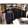Image 4 : LOT OF 9 DISPLAY RACKS AND CONTENTS INCLUDING JACKETS, VESTS, SHIRTS AND PANTS