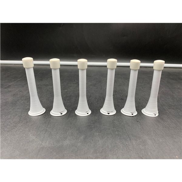 Lot of Spring Door Stoppers, White