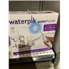 Image 1 : Waterpik Water Flosser System