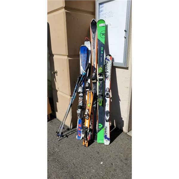 LOT OF KIDS AND ADULT SKIS W/ BINDINGS AND POLES