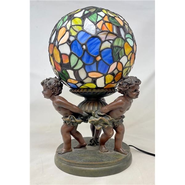 Globe Lamp with 3 children holding it up