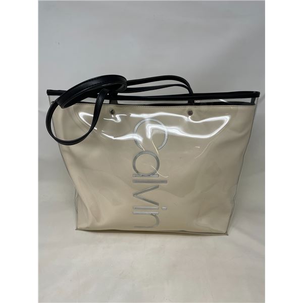 Gently used Calvin Klien Cream Purse