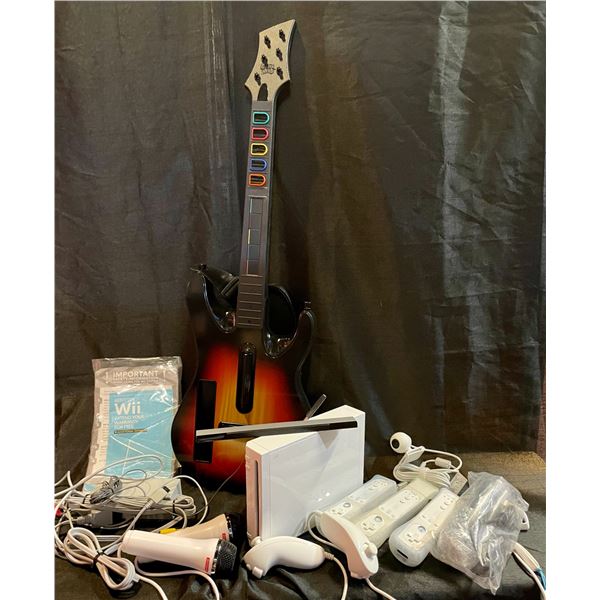 Wii, Wii Remotes, Microphones and Guitar