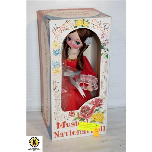 VINTAGE MUSICAL DOLL IN BOX OVER 60 YRS OLD