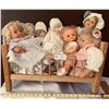 Image 1 : Wooden Baby Crib Full Of Soft Sculpture Baby Dolls and Collectible Antique Babies