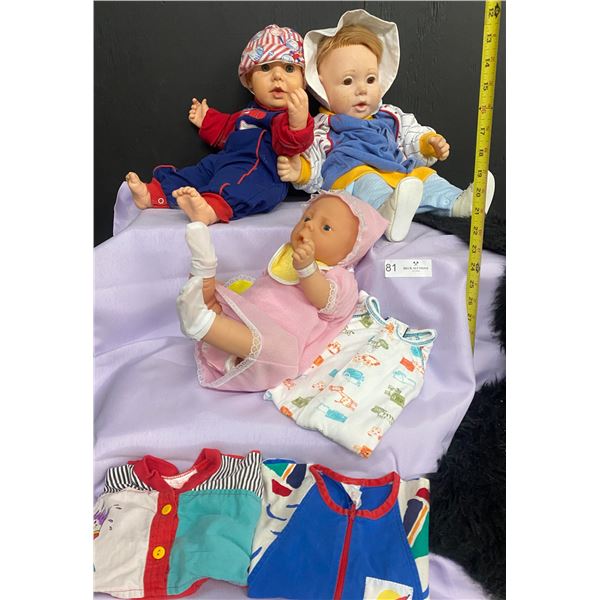 Three Soft Bodied Hard Head Collectible Dolls with extra Outfit for each