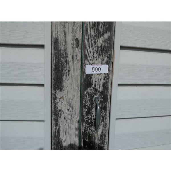 wooden barn style 10' x 12'  shed on skids