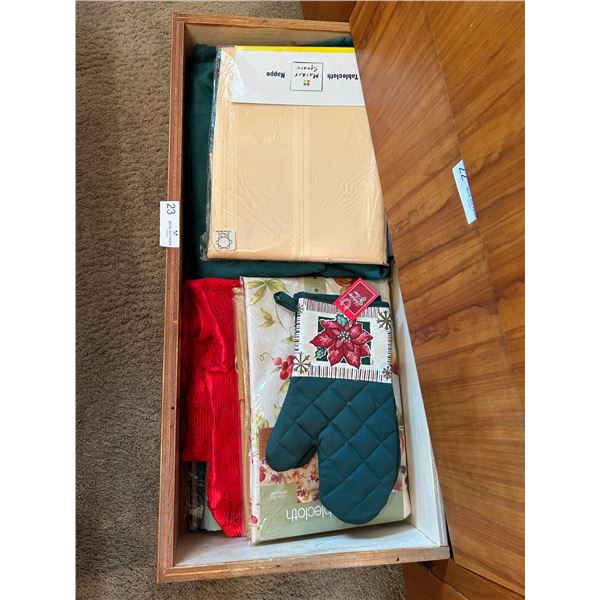 Drawer Full Of Festive Table Cloths And Decorative Goods