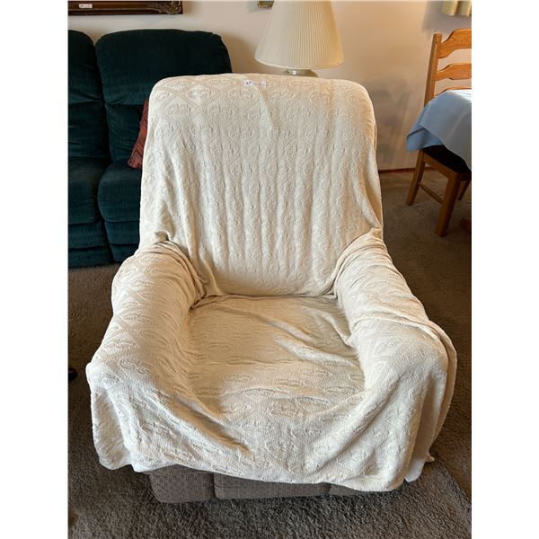 Well Used Beige Recliner