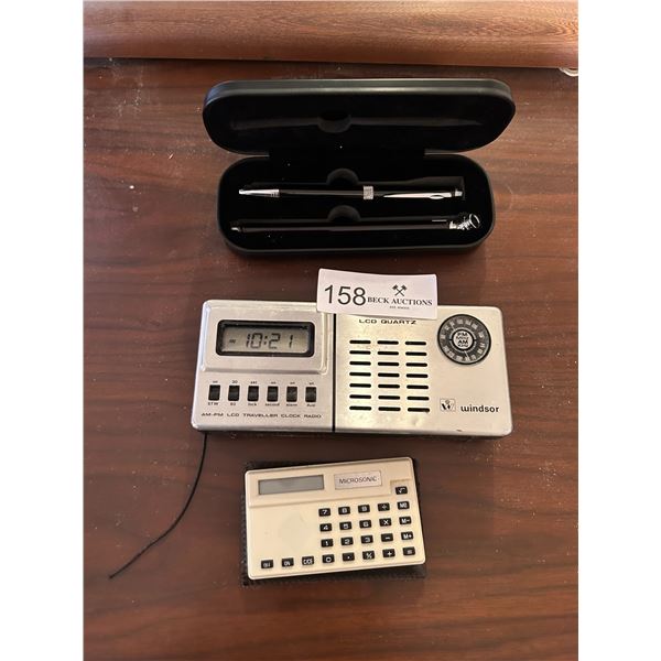 A Windsor LCD Quartz Alarm With Assorted Goods