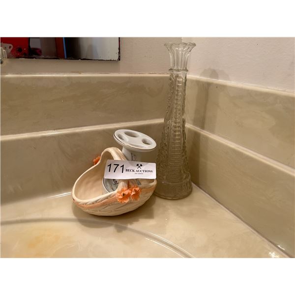 Assorted Bathroom Goods With A Glass Vase