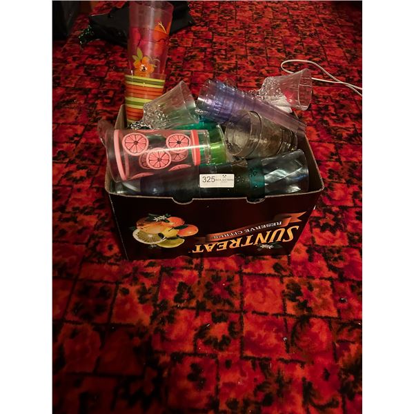 Assorted Glass And Cup Goods With A Lemon Desigin Cup