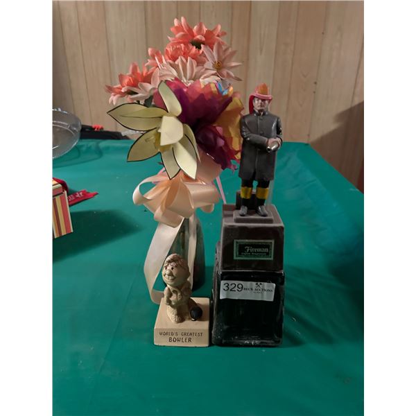 Assorted Statues With Fake Flowers