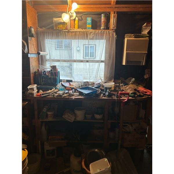 Workbench Of Assorted Tools With Screwdrivers