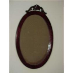 Wood framed oval mirror w/carved top-18.5 x 28.5