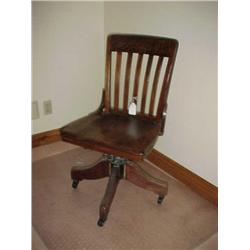 Oak rolling secretary chair