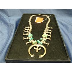 old squash blossom necklace purchased from famous