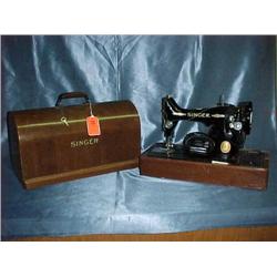 Old singer sewing machine with wooden dome lid