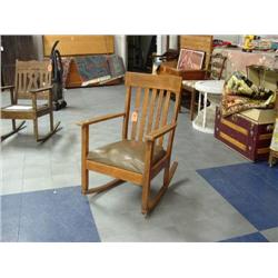 Old oak rocker with leather seat