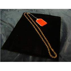 Gold and rhinestone 30" necklace by Dauplase