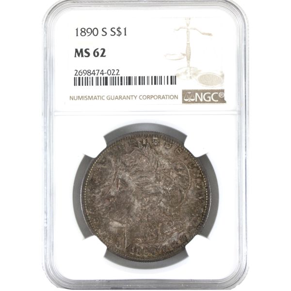 USA Silver 1890 Morgan Dollar NGC MS62. Natural Coin with Tones of Russet & Sandstone-Red