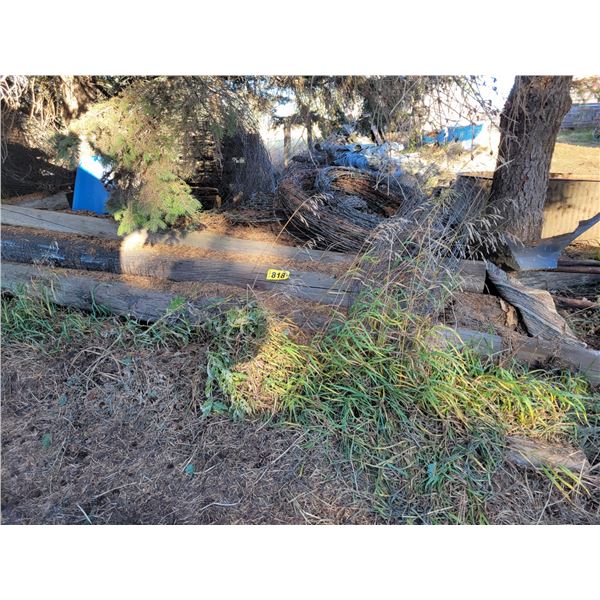 Pile of posts, timbers, wire, mesh