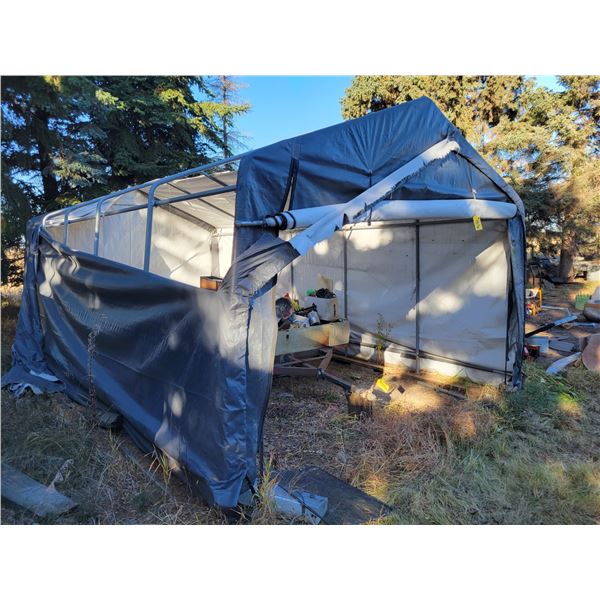 Grey tarp shed