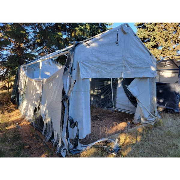 White tarp shed