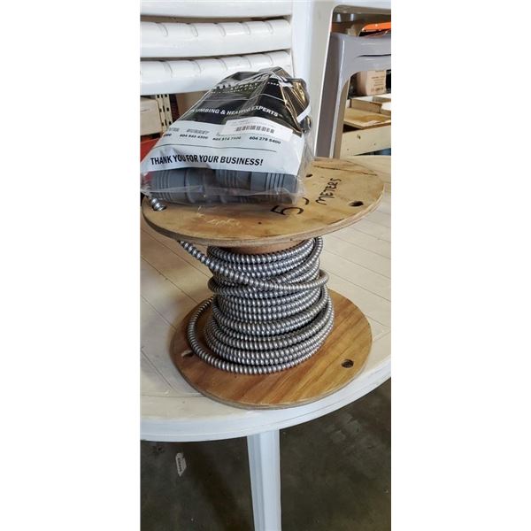 SPOOL OF 3 WIRE ELECTRICAL CABLE AND PLUMBING PVC