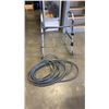 Image 1 : GARDEN HOSE AND FOLDING WALKER