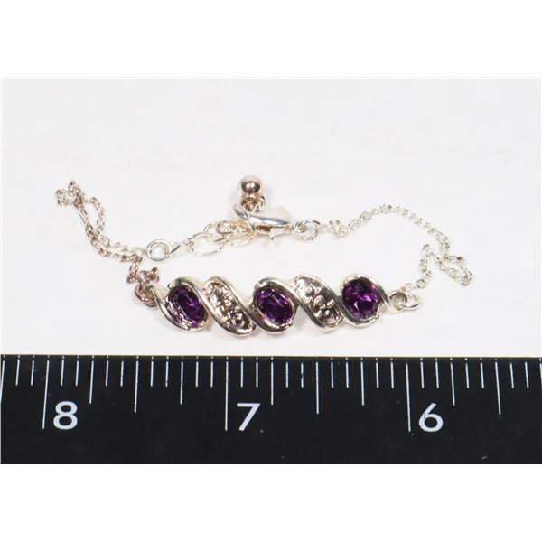 SILVER TONE BRACELET WITH PURPLE RHINESTONE