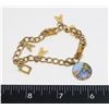 Image 1 : GOLD TONE WATERTON LAKE CANADA CHARM BRACELET