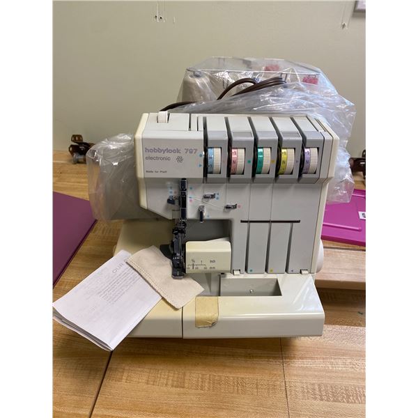 Hobbylock 797 serger 5 spool 6 month warrant after auction sale