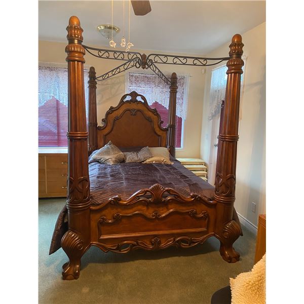 Queen poster bed with mattress and box spring