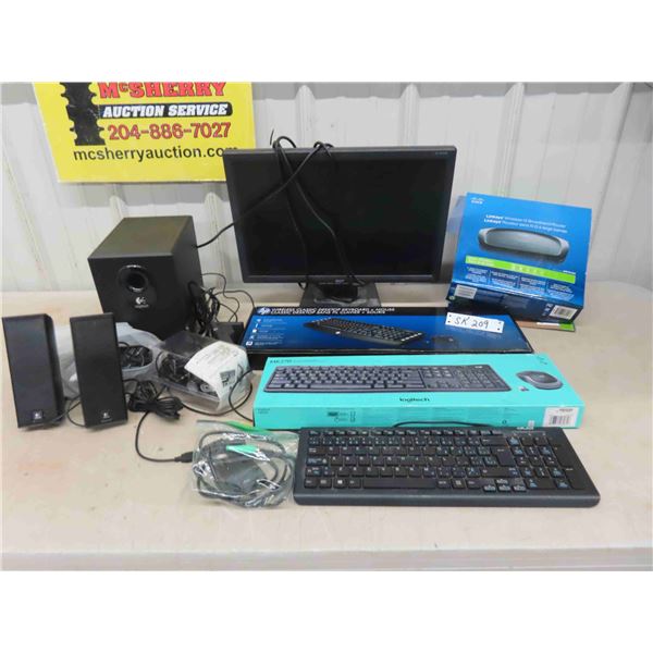 Computer Monitor, 3 Keyboards, Router, Speakers