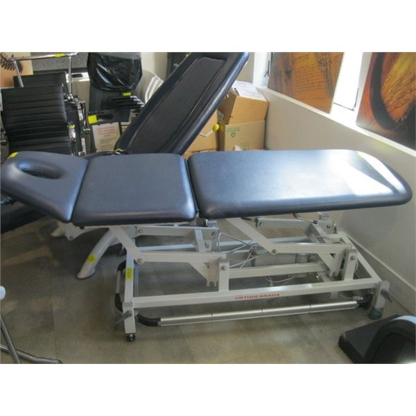 SEERS MEDICAL ELECTRIC FULLY ADJUSTABLE TREATMENT TABLE ON CASTORS