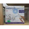 Image 1 : Waterpik Water Flosser Twin Pack - Open box