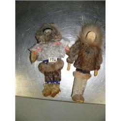 2 Eskimo Dolls :  One has leather face, other wood face 10"  long (74)
