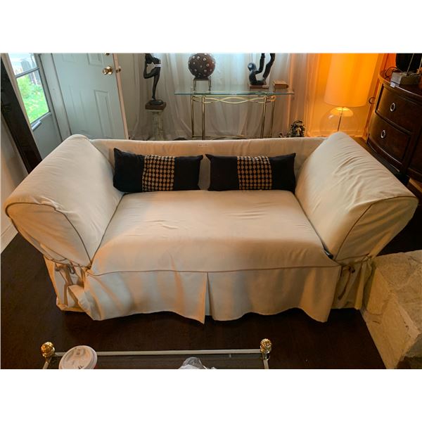 Loveseat Couch With Beige Covers, And Decoration Pillows
