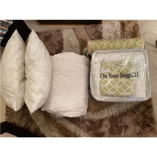 Large Assortment Of Pillows And Blankets