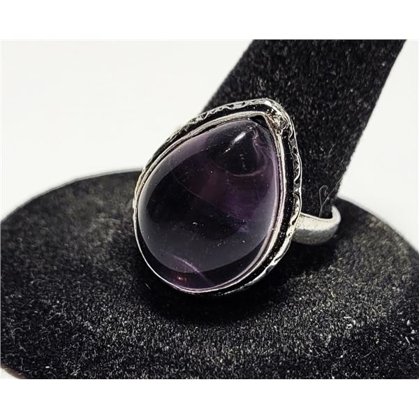 34)  BEZEL SET NATURAL PURPLE PEAR SHAPED AMETHYST