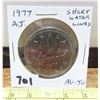 Image 1 : 1977 Attached Jewels Short Water Lines Nickel Dollar. AU-50, Scarce variety.