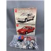 Image 1 : 2 Almost Complete ERTL AMT 1/25 Scale Models - Beretta GTU & Ford Taurus SHO Plus 1 Unknown