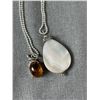 Image 2 : 2 Sterling Silver Chains with Pendants. 1 Pendant is Amber. 14.53 Gr