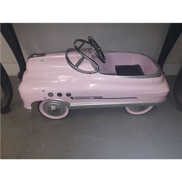 Pretty Pink Princess Pedal Car presented for your perusal. 36"