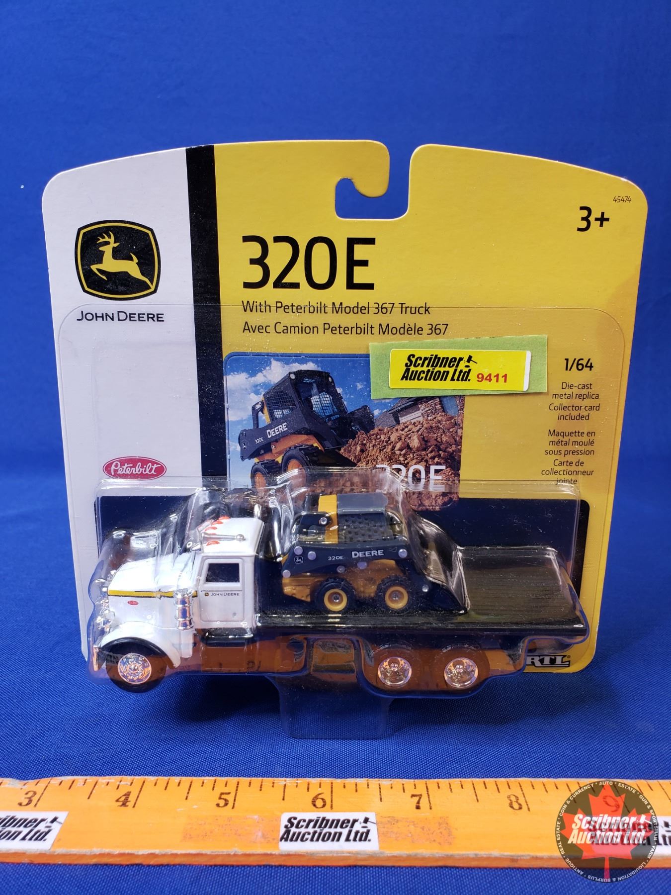 John Deere 320E Skidsteer with Peterbilt Model 367 Truck (Scale 1:64 ...