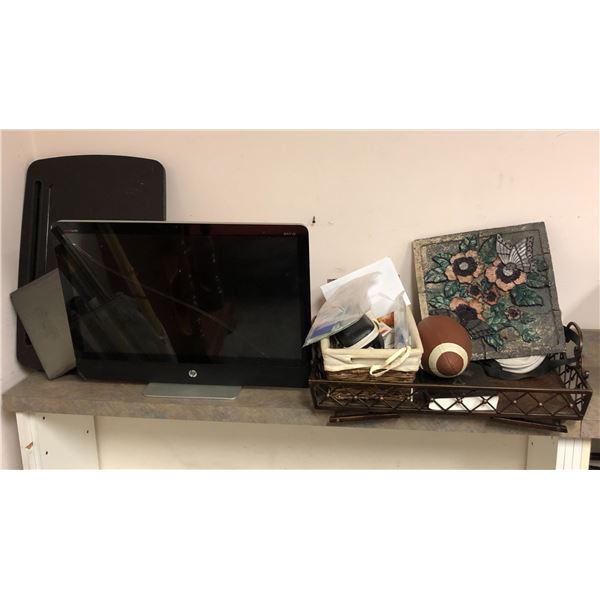 Group of misc items including football, broken monitor, decor, etc...