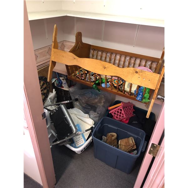 Room full of misc items including - dart board, clothing, baby crib, wrapping paper, etc...