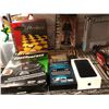 Image 7 : 3 Shelf lot of misc items including - Sanus tilt + extend tv mount, checkers, Sons of Anarchy doll, 
