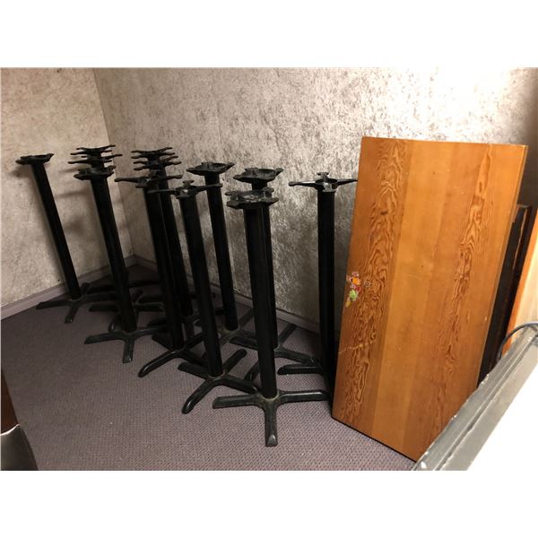 Group of restaurant-grade tables & stands  (approx. 12 bases, approx. 9 table tops) (large tables 85